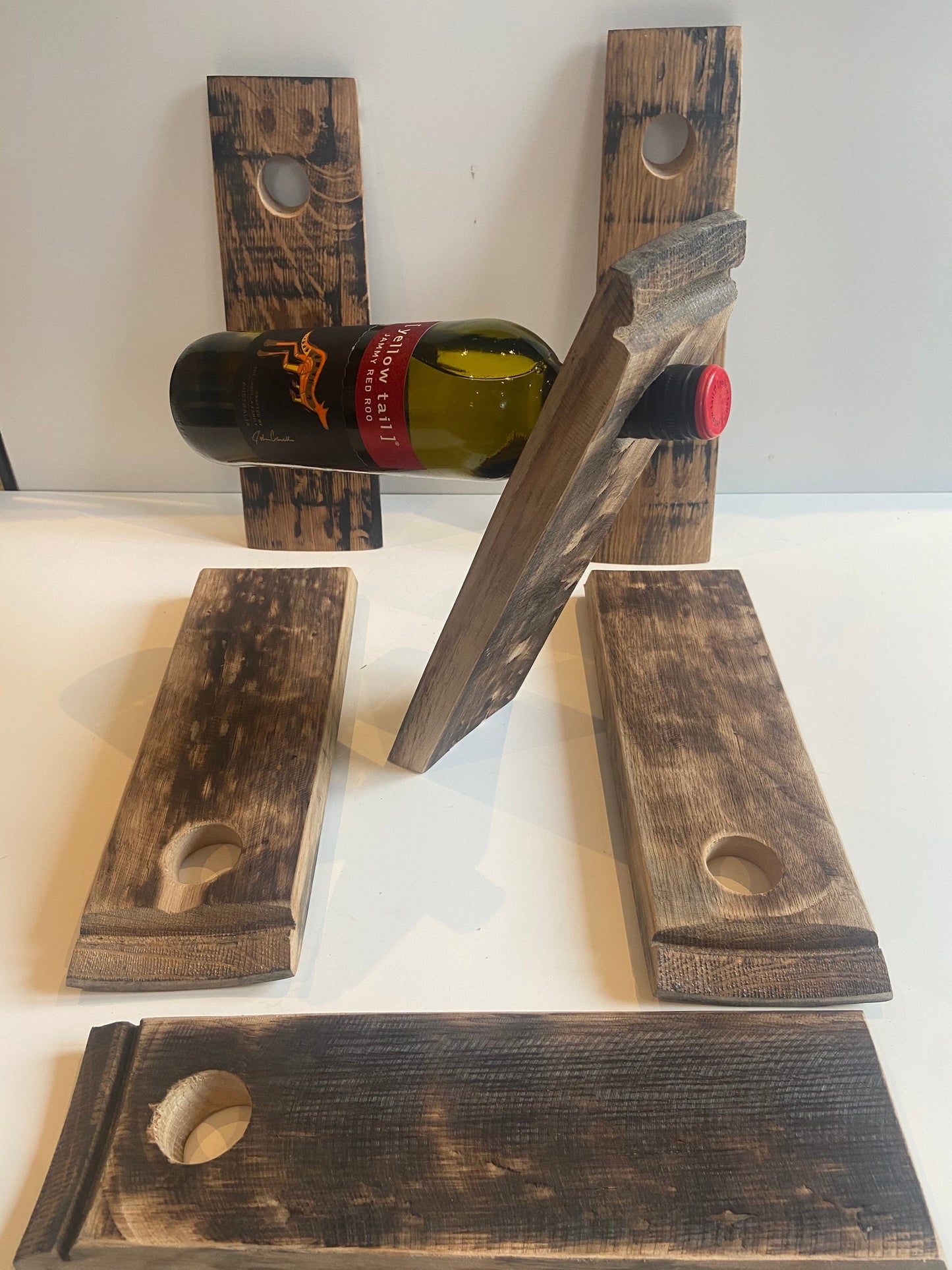Gravity wine bottle holder