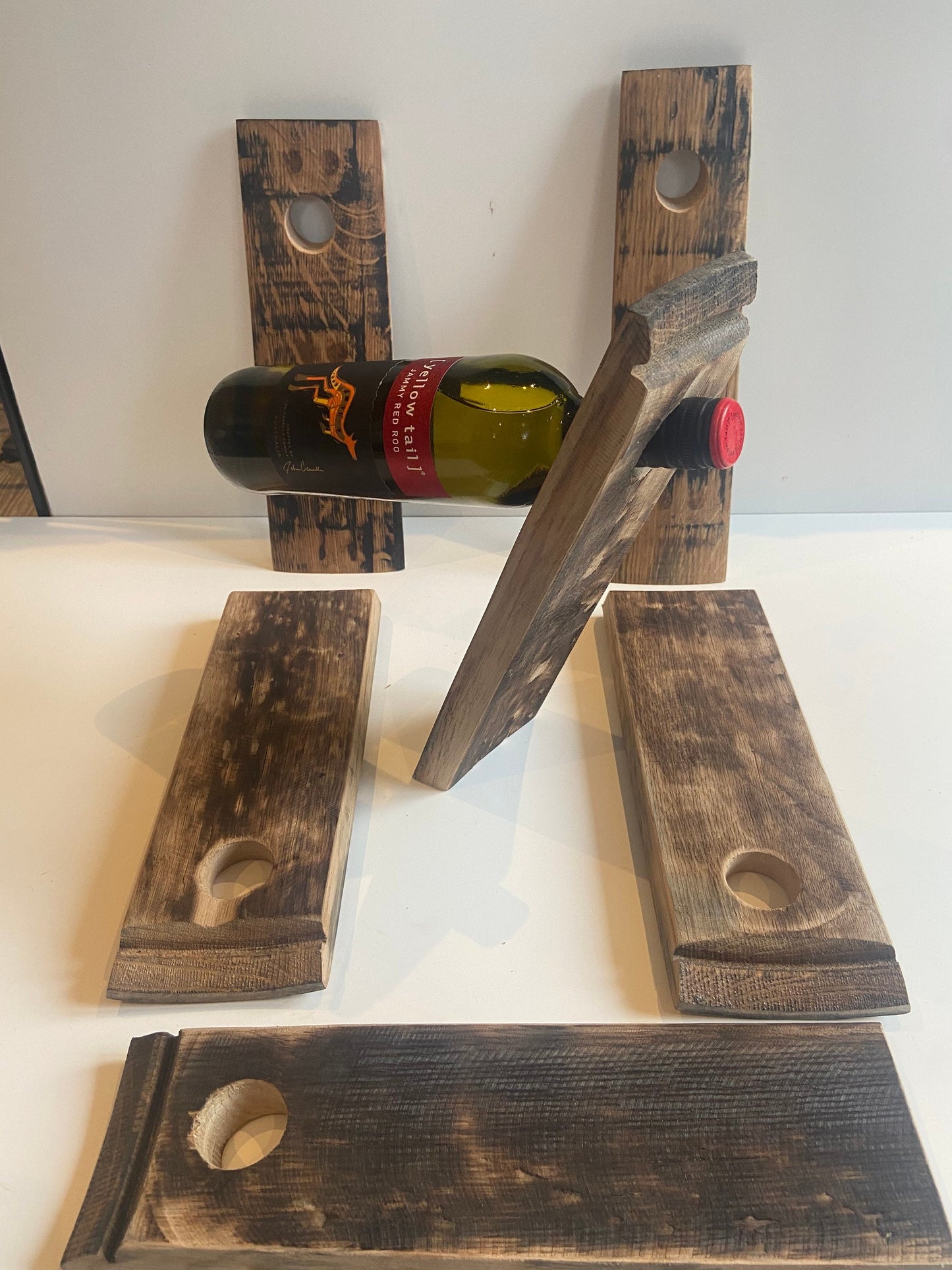 Gravity wine bottle holder