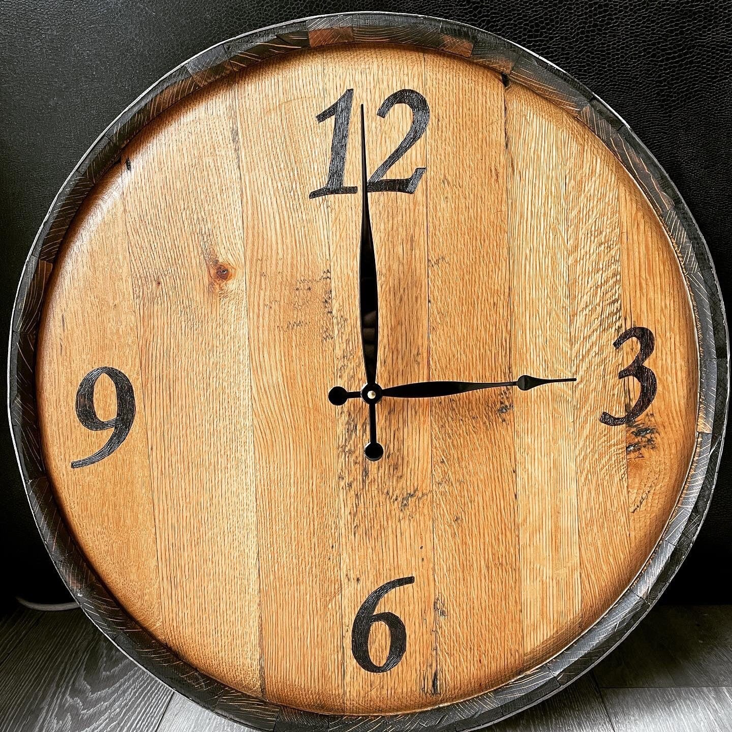 clock handmade from a whisky barrel end