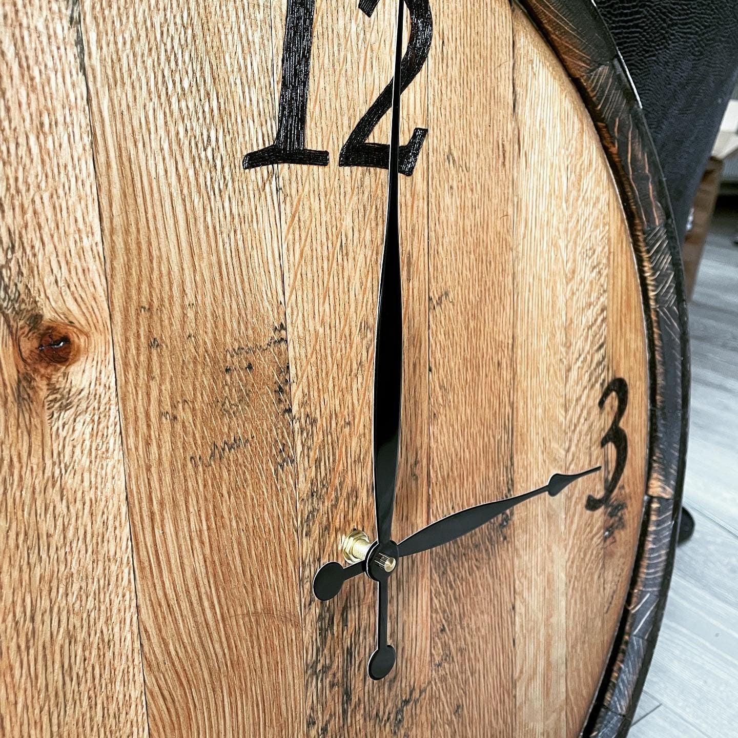 clock handmade from a whisky barrel end