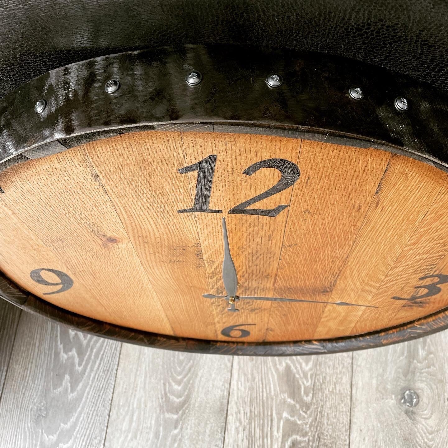 clock handmade from a whisky barrel end