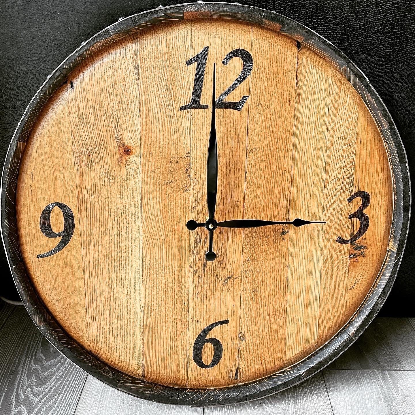 clock handmade from a whisky barrel end