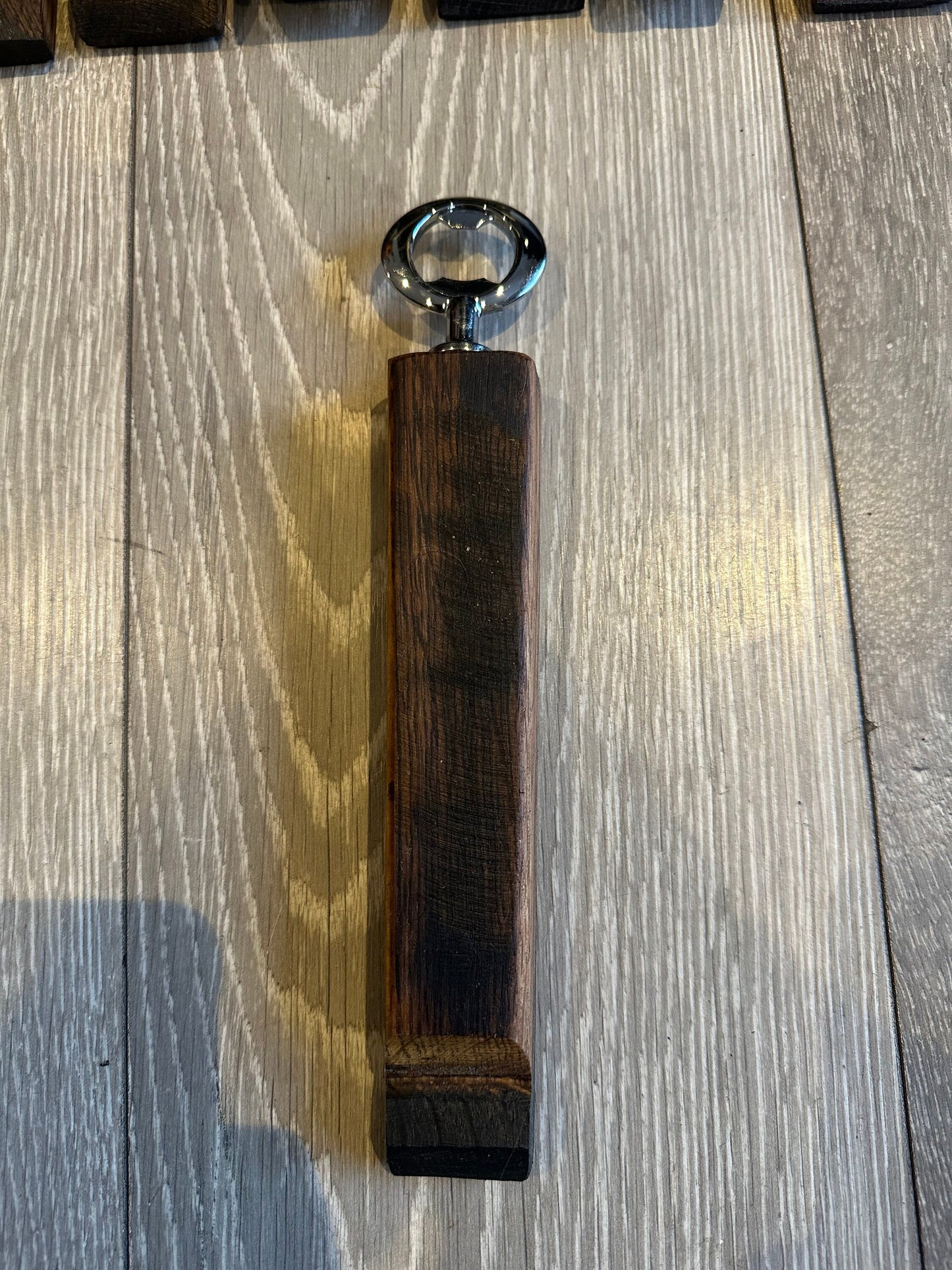 Whisky barrel stave bottle opener