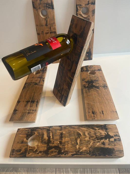 Gravity wine bottle holder