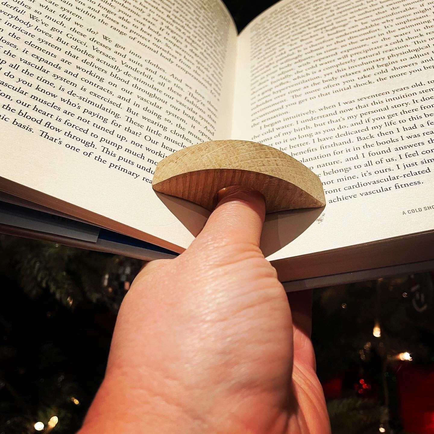 thumb ring book holder made from a whiskey stave